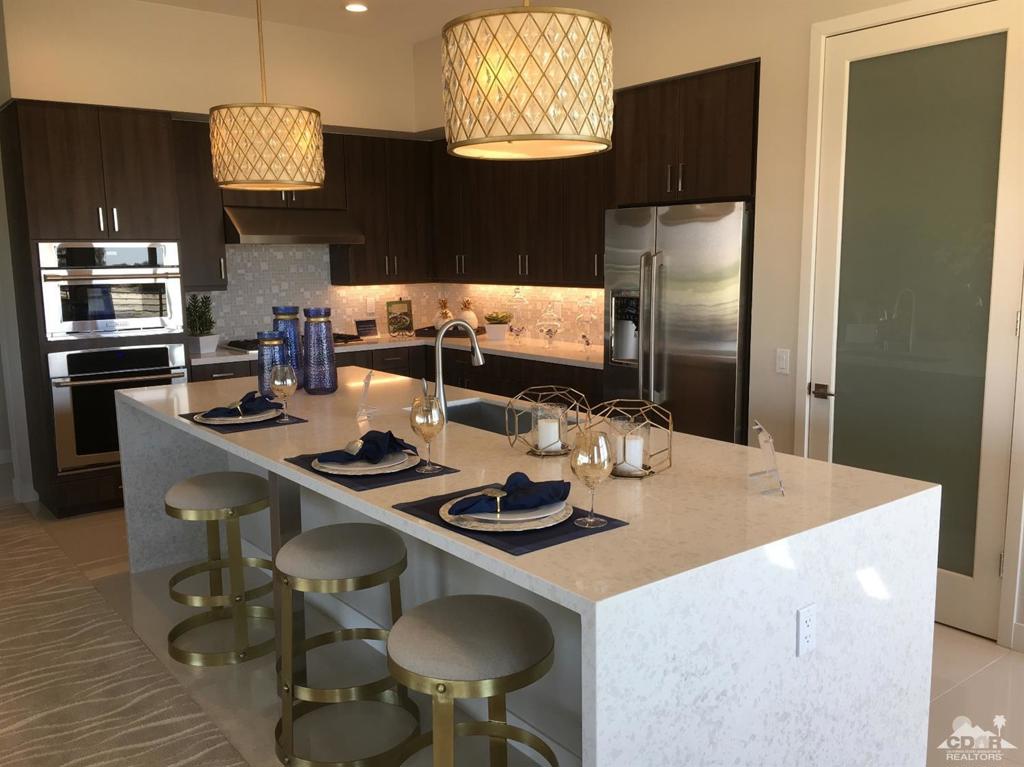 Incredible new Condo community in Palm Desert. Each floorplan is designed like a house, with all of the lock & leave convenience of a condo. Come see why this community has been selling so quickly. Beautiful plans, fantastic location, incredible amenities!