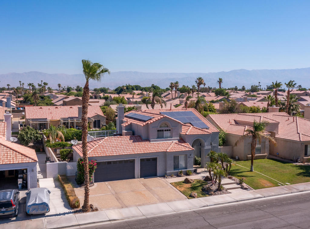 Enjoy resort-style living in this freshly painted (inside and out) 4-bedroom, 3-bath home located in La Quinta. Offering approximately 2,300 sq. ft. of interior space, this residence features an inviting open layout designed for comfortable indoor/outdoor living.The home features solar panels and the backyard is ideal for relaxation and entertaining, complete with a saltwater pool, raised spa, built-in fire pit, water features, and covered patio. The home is offered unfurnished. Lease includes pool service and gardening twice weekly and monthly housekeeping provided by the owner.Key Features4 Bedrooms / 3 BathroomsApprox. 2,300 sq. ft. of living spaceIndoor/outdoor flow with covered patioSaltwater pool & raised spaBuilt-in BBQs, water features & fire pitSolar panels for energy efficiencyOwner-provided pool service, gardening, and monthly housekeepingUnfurnished / Annual lease