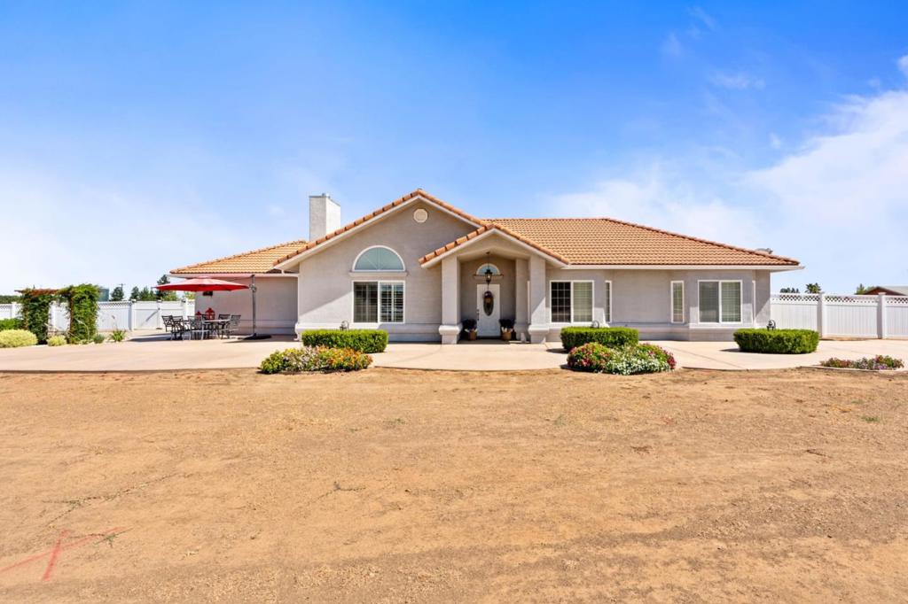 Welcome to this luxurious newly remodeled 4 bed 2 bath home on 1.1 acres in Valley Lakes Ranchos, located in the vibrant city of Madera. This spacious property offers 2,089 square feet of living space and sits on a generous lot of 47,916 square feet. The kitchen is a culinary delight, featuring granite countertops, a built-in oven, microwave, electric cooktop, and a trash compactor. Additional amenities include a security gate, central AC, and ceiling fans ensuring comfort throughout. The home boasts stone flooring, adding a touch of elegance, and a cozy fireplace perfect for family gatherings. The laundry is conveniently situated inside the utility room for ease of use. This property falls within the Madera Unified Elementary School District. With features like double pane windows and energy-efficient lighting, this home is a perfect blend of style and sustainability. Make this lovely Madera home yours and enjoy all it has to offer.