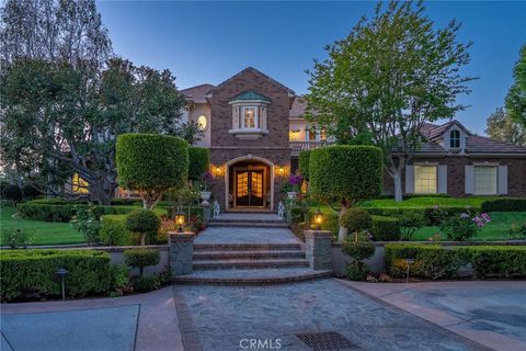 Photo of 6952 Royal Hunt Ridge DR, Riverside, CA 92506 (MLS # IV26096976)