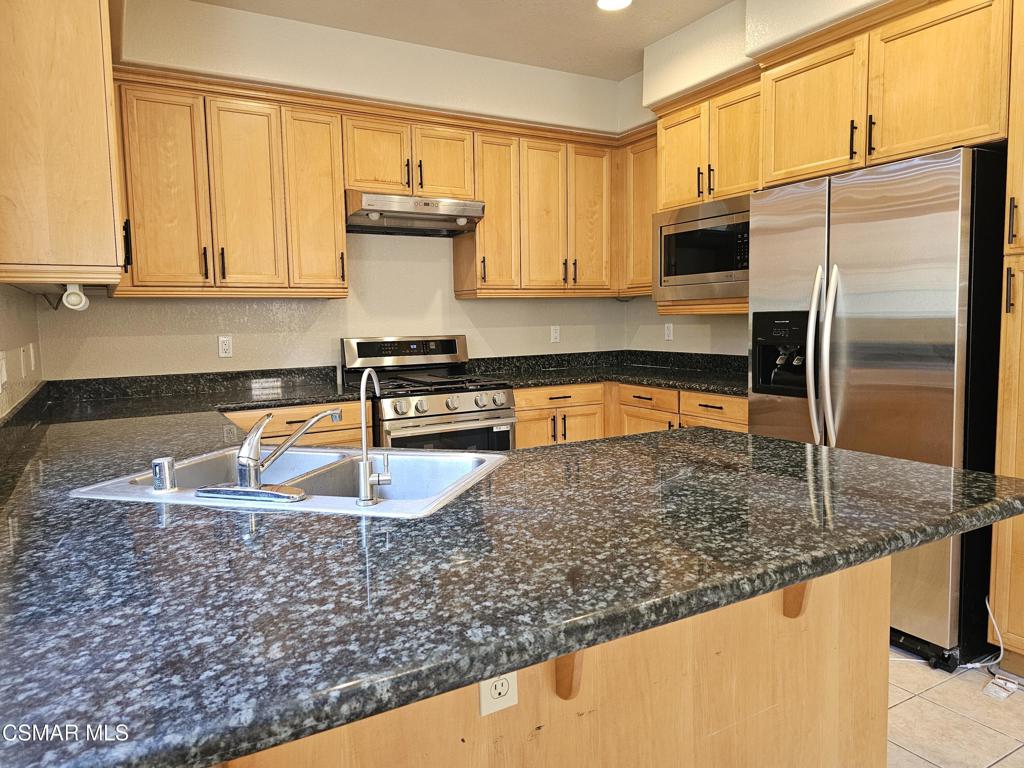Ready To Be Move Into. Beautiful modern townhomes in gated community in the heart of Tarzana. Freshly Painted! It has 4 bedrooms upstairs & 2.5 bathrooms & pine-wood flooring through most of the home . All the 4 bedrooms upstairs & 2 fullsize bathroom on the 2nd floor & half bathroom downstairs. Updated kitchen with granite counter-tops & lots of cabinet space & tile flooring, new stove & new dishwasher. Living room & family room & formal dining room. Spacious master bedroom suite, with large bathroom, with dual sink & private bathtub & separate shower & walk in closet. Private laundry room upstairs, with high end washer & dryer. Two-car garage with direct access. Easy maintenance backyard. Refrigerator, washer & dryer included in the lease. Located just north of the 101 freeway, close to Ventura Blvd's shopping and dining, and right around the corner from Providence Cedars-Sinai Tarzana Medical Center. Ready to be moved into!