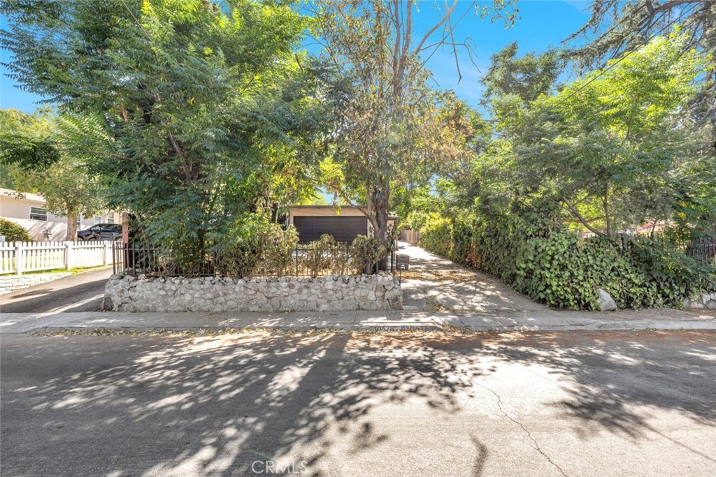 Charming 2 bedroom 1 bathroom rental in the heart of Tujunga. This well maintained front unit offers a private setting with an attached two car garage that provides direct access to the home, along with an additional parking space in front. Inside, you will find elegant mixed wood flooring, recessed lighting, and abundant natural light throughout the space. The full kitchen features marble countertops, ample cabinetry, and tile flooring that extends into the bathroom for a clean and cohesive design. Both bedrooms are spacious and comfortable, offering generous storage and a peaceful atmosphere. This is a wonderful place to call home, located in a desirable Tujunga neighborhood and ready for immediate move in.