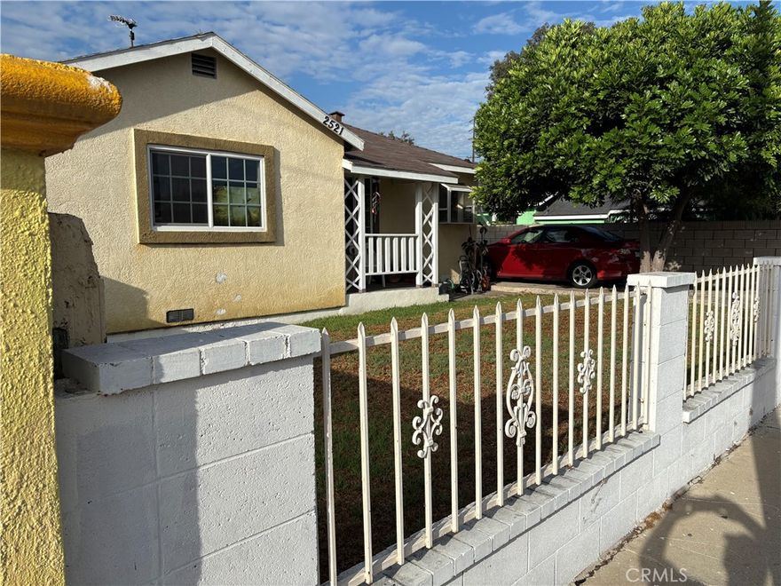 2 BEDROOM 1 BATH HOME, WITH 2 CAR DETACHED GARAGE, WALKING DISTANCE TO CENTENNIAL REGIONAL PARK.