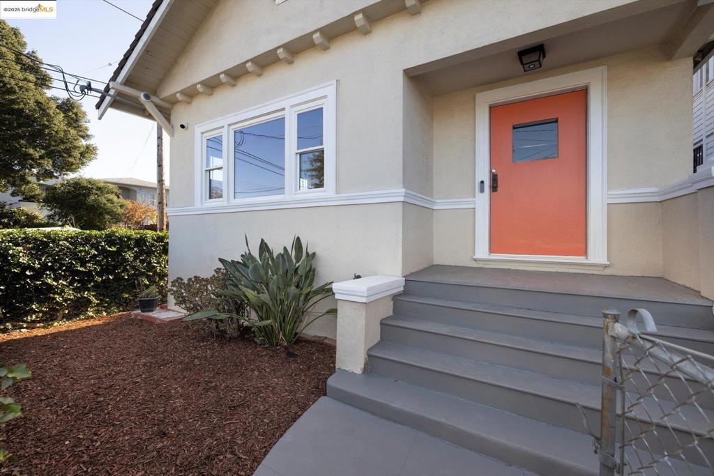 Welcome to 1641 E. 20th Street, where timeless Craftsman character meets modern comfort. Tucked away in Oakland’s vibrant San Antonio neighborhood, this thoughtfully updated 2-bedroom, 1-bath jewel radiates warmth, charm, and a sense of home the moment you arrive. Inside, sunlight pours through picture windows, dancing across new engineered hardwood floors. A cozy fireplace anchors the living room, while the dining room’s built-in cabinetry nods to classic design. The upgraded kitchen offers stainless steel appliances, refreshed finishes, and everyday functionality, while the bathroom provides a spa-inspired retreat. Beyond the walls, the inviting front porch is the perfect spot for morning coffee or evening relaxation with neighborhood views. Step into the backyard and imagine creating your own garden, play space, or outdoor entertaining area. With over $60,000 in recent Curbio improvements, this home blends historic charm with modern upgrades — giving buyers the confidence of major work already completed, while still leaving room to personalize. Just minutes from Lake Merritt, Fruitvale BART, and I-580, you’ll enjoy the perfect balance of peaceful residential living with quick access to the best of the East Bay.