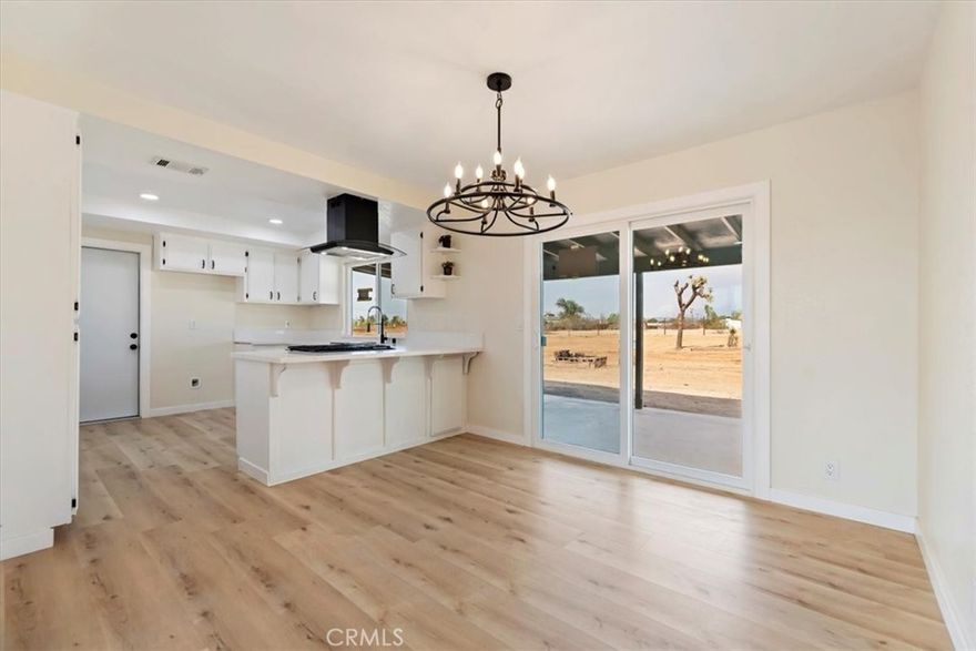 Welcome to “King of the Hill” — a beautifully updated 3-bedroom, 2-bathroom retreat perched atop 1.21 private acres with panoramic views of the mountains and valley below. Enjoy peace and privacy while staying just minutes from shopping, dining, and freeway access.

Step inside to 1,249 sq. ft. of open, sun-filled living space featuring new LVT flooring, fresh interior and exterior paint, new dual-pane windows, and remodeled bathrooms with custom tile showers. The modern kitchen showcases quartz countertops, white cabinetry, and new stainless-steel appliances. Large picture windows frame the sweeping views, creating a seamless connection between indoor comfort and outdoor beauty.

Move-in ready and perfectly situated, this hilltop gem offers the best of both worlds — modern living and timeless tranquility.