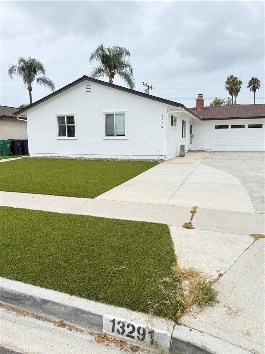 a beautifully remodeled 3 bedroom, 2 bathroom single-family home with 1,280 sq. ft. of living space. This front main house sits on a 7,200 sq. ft. lot shared with a newly built ADU in the rear, with each unit enjoying its own address, separate utilities, and private fenced yard. The home features a 2-car garage plus a long driveway (shared with the ADU) that can accommodate up to 4 additional cars. Inside, you’ll find an updated kitchen with granite countertops and stainless steel appliances, modernized bathrooms, real hardwood flooring throughout, and central AC for year-round comfort. Ideally located in a great neighborhood with access to highly rated schools, shopping, dining, and both the 405 and 22 freeways, this home offers convenience and quality living. Move-in ready, we are looking for a loving family who values a well-cared-for home and is interested in staying with us for the long term.