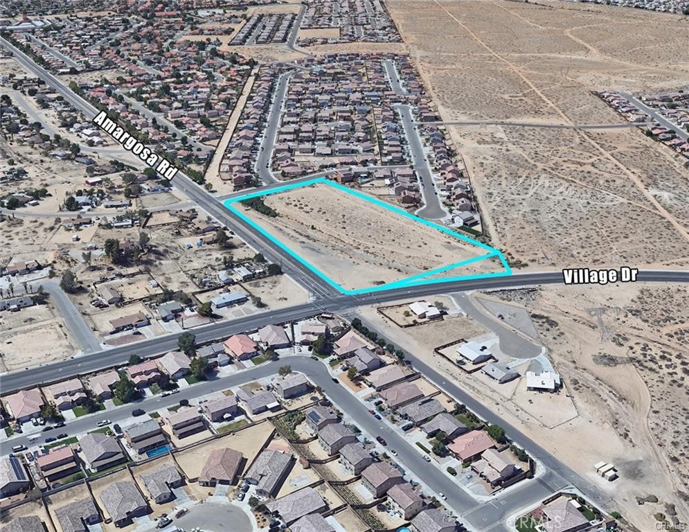 6.89 ac at the Southwest corner of Amargosa Rd and Village Dr. Fantastic corner at a signalized intersection. Current Zoning is R-1 but properties are located within a designated Initiative zone. The Initiative Zone has certain commercial allowances that aren’t found elsewhere within the City boundaries. In accordance with Section 16-3.07.020(g) of the Development Code (Title 16) entitled "Special requirements for certain permitted and conditional uses," those uses listed under the C-1 Zone within the Land Use table may be allowed within residentially zoned City Initiative Areas through approval of a Conditional Use Permit. Drainage Channel does run through both parcels and there are recorded plans for the drainage through the City Master Drainage Plan that can be sent by request.