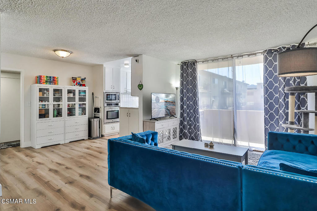 Situated in an ideal Encino location, just off of Ventura Blvd, this updated one bed, one bathroom condo is more than meets the eye. The spacious and open living area allows for a variety of design set ups with natural light pouring into your home. If you need storage, the unit has you completely covered with a walk-in closet in the bedroom, and THREE hallway closets including four linen cabinets, a shelving closet, and a second walk-in. The bedroom easily fits a king size bed with ample room for wardrobes and dressers. Recent updates include a new vanity and mirror in the bathroom, smart thermostat, and the unit has been recently painted. The complex has community laundry rooms, but in this unit, you won't have to travel far, as the nearest laundry room is conveniently located directly across the hall. Additionally, the unit comes with a covered parking space. With its prime location, ample amenities, and attractive price, you simply couldn't ask for more.