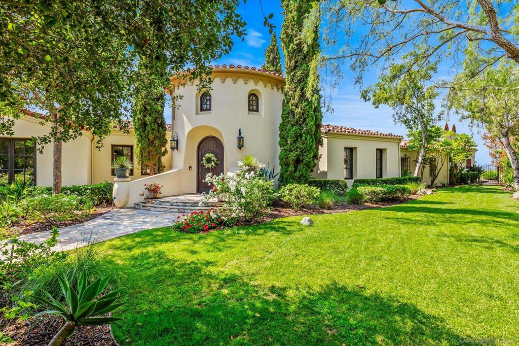 Santaluz Charmer! The private backyard is an entertainer's dream, featuring a stunning pool with a waterslide, a spa, and a spacious outdoor kitchen with seating for six. You can also relax by the fire pit or dine al fresco in the cozy loggia, complete with a fireplace. The home is also equipped with a fully owned solar system with 3 Tesla Power Walls. The interior boasts a thoughtful and open floor plan. The large master suite includes a private retreat, an exercise room, and a luxurious master bathroom. The home also has four additional en suite bedrooms and a private den or office. The gourmet kitchen is a chef's delight, with a large walk-in pantry and an adjacent eat-in area. The expansive living, dining, and family rooms are perfect for hosting large gatherings. The property features beautifully manicured landscaping and is just a short stroll from the Hacienda Club, Village Green, and the Santaluz Golf Club. Outside, the resort-style amenities are endless, featuring a custom-designed pool and spa complete with a waterfall, natural rock grotto, and waterslide. An expansive entertainment patio, a grand outdoor fireplace, and a giant fire pit are perfect for evening gatherings. All of this is surrounded by lush, manicured landscaping that provides both beauty and privacy. Inside, the home boasts a chef’s kitchen with premium appliances and two dishwashers. Additional features include an oversized 3-car garage, three Tesla power walls, and fully owned solar panels. For the outdoor enthusiast, the home offers direct access to Santaluz’s miles of walking and hiking trails. Santaluz offers an exclusive and serene living experience within a 3,800-acre, guard-gated community that features 836 custom homes. This master-planned community is celebrated for its commitment to preserving natural open space, with nearly 1,000 acres of untouched land, golden hillsides, and panoramic views of the golf course, coastline, and ocean. Residents have abundant recreational and social opportunities with two distinct clubhouses. The Hacienda Club provides a heated Junior Olympic-size pool, lighted tennis courts, and a fitness center with classes. It also features The Bistro for casual dining and hosts various social camps and events. The Santaluz Club offers a private, 18-hole Rees Jones-designed championship golf course and a full-service spa, along with casual and fine dining options. Membership is required to access these club facilities. The community is also located within the desirable and award-winning Poway Unified School District, known for its commitment to academic excellence and student success. Located on a highly sought-after cul-de-sac in Santaluz, this single-story home offers panoramic ocean and sunset views. Designed for seamless indoor-outdoor living, it embodies the luxurious California coastal lifestyle.