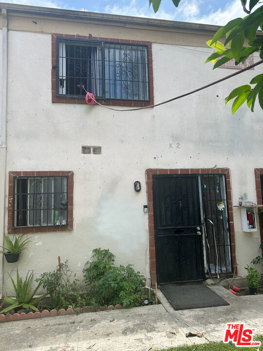 This couzy two condo unit has two bedrooms and 1.5 bathrooms it has their own parking space, plus an extra parking, it is a gated community. one bathroom is in the first floor, as well the Kitchen, dining and living room. through the living room has a door that takes you to the back patio. The second floor has two bedrooms with spacious closeths, and a full bathroom. On this property complex, it has two pools, playgroung and laundry room water sewer and trash expenses are covered by the HOA. this property is located within the very short distance of Walker Elementary, Sierra Preparatory Academy, Century High School, as well the shoping center and the beautiful downtown of Santa Ana, and many other amenities, such has Santa Ana Zoo and others.