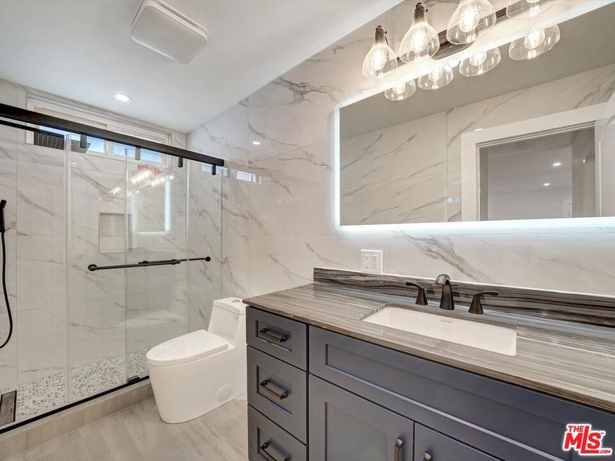 This completely renovated Top-Floor condominium is located in the popular Norma Triangle of West Hollywood. This fully remodeled unit features a new kitchen, elegant flooring, a luxurious bathroom, a dual-zone central mini-split A/C system, a new stove, dishwasher, and microwave, complemented by the convenience of in-unit washer and dryer hookups. With double-paned windows throughout, abundant storage space, and a spacious walk-in closet, comfort and practicality are at your fingertips. Enjoy the privacy of having only one shared wall and relish the seamless flow from the living room and bedroom to a generous balcony. The building features a large courtyard pool, a new fitness room/gym, and a gated garage with assigned parking spots. HOA dues include gas and water utilities. Ideally situated just two blocks from the vibrant Sunset Strip, Doheny Drive, and Beverly Hills, this condo offers easy access to Santa Monica Blvd, West Hollywood Park, WeHo Library, and Cedars-Sinai Hospital. Indulge in the dynamic lifestyle with nearby shops, restaurants, and entertainment venues at your doorstep. The mortgage loan rate buydown is available for the first year at no additional cost. Easy to schedule a showing or a video tour.
