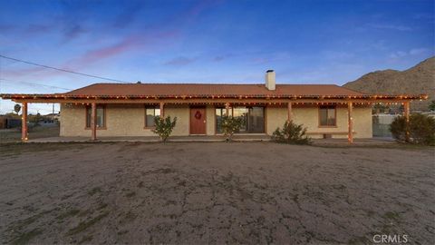 Photo of 16043 Saint Timothy Road, Apple Valley, CA 92307 (MLS # CV25273473)