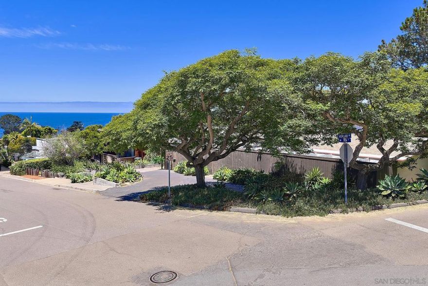 On the market for the first time, embrace this enormous new-era opportunity in Olde Del Mar. Featuring ocean vistas, the four-unit 14,000sf property can be preserved as an investment. Or build your dream home on this majestic corner lot. Framed by lush landscape, this sophisticated single-story was designed in 1958 by Mid-Century Modern architect Guy Anderson. Each 2BR,1BA unit features private patios w/ sliding glass doors, beaming natural light across vaulted ceilings. Walk to Del Mar Village & beaches.  A unique parcel for an equally unique buyer. From its quiet hillside setting, the property recalls the early spirit of Del Mar. In the same family since its inception, the “Schneider Apartments” were commissioned at the zenith of mid-century design. A minimalist masterpiece that maximizes natural  beauty, architect Guy Anderson worked alongside notable landscape architect Roy Seifert to create zen tranquility that infuses every inch of this lot, which abuts Ninth Street, Highland Avenue and an alleyway.   The four-unit residence has retained the original and essential elements that make this an exemplary architectural gem. Preserve the character and update the property to cherish it as an income opportunity for many years to come.   Or, the next buyer can steward this opportunity to build a new, timeless 3,583sf home that exudes classic post-and-beam MCM style. Situated on a large lot there is plenty of potential!   Embrace the walkable, enviable North County lifestyle. The property is close to the bluff trails, wide sandy beaches and a buzzy Del Mar Village scene. Restaurants and cafes—plus a new grocery store and book store—have reenergized Del Mar’s status as an extremely viable downtown with a post office, library, city hall, and farmers market. The low-scale design, meanwhile, retains Del Mar’s OG charm.