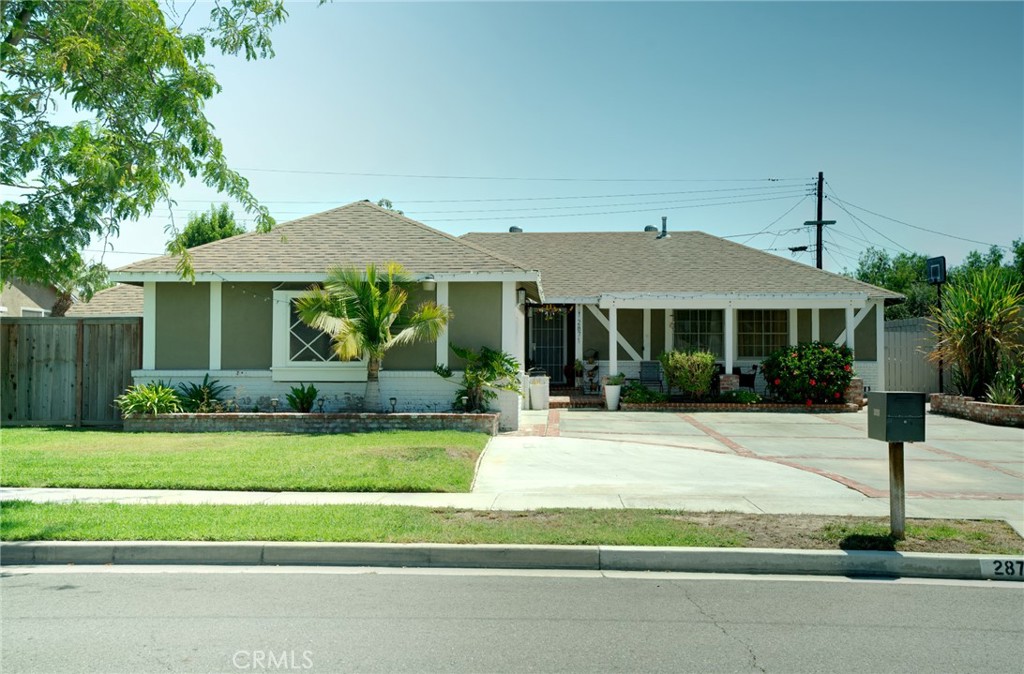 This house has everything you need! The family room is currently being used as a fourth bedroom and has an unpermitted bathroom, making it perfect for a mother-in-law or teenager. There are separate entrances at the front and back for easy access.
About a year ago, the home was updated, including the bathroom, kitchen, covered patio, and front sitting area. It has a nice, open layout and looks great from the outside, located in a lovely neighborhood. There are many improvements to mention, and it's conveniently close to highways and shopping.
Plus, it's just 10-13 minutes from Disneyland Park and 5-7 minutes from Knott's Berry Farm. You really need to check it out!