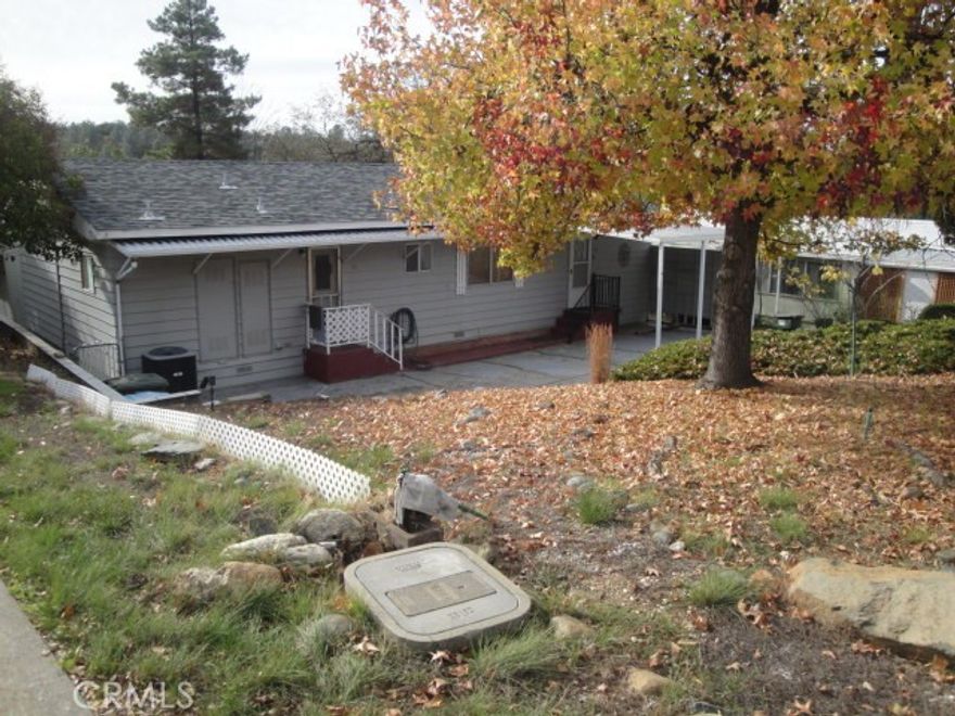 PERFECTLY PRICED MOBILE HOME IN KELLY RIDGE!  All the big stuff is done.  Roof information is in supplements. Newer HVAC, 40 Gallon Water Heater. Just move into this 2 Bedroom 2 Bath and make it your own. Laminate flooring in kitchen, guest bedroom, guest bathroom and laundry room. Good size kitchen with excellent layout and lots of cabinets plus walk-in pantry and refrigerator is included. From the kitchen there is a pass through bar to the dining area with room for seating at the bar.  The dining area is roomy and includes a built-in hutch. The living room is large and has a ceiling fan plus a sliding door to a nice little covered deck for outdoor enjoyment. The guest bedroom is good size with a large closet, ceiling fan and has direct access to the guest bathroom. The guest bath has a corian top vanity and a tub shower combination. Primary bedroom is large with mirrored closet doors, ceiling fan and carpeting. Primary bath has laminate flooring, corian counter top and shower. Laundry area has lots of storage cabinets including washer and dryer. Outside there is a good size shed with concrete flooring, workbench, and electricity.  Excellent Price and Excellent Opportunity!