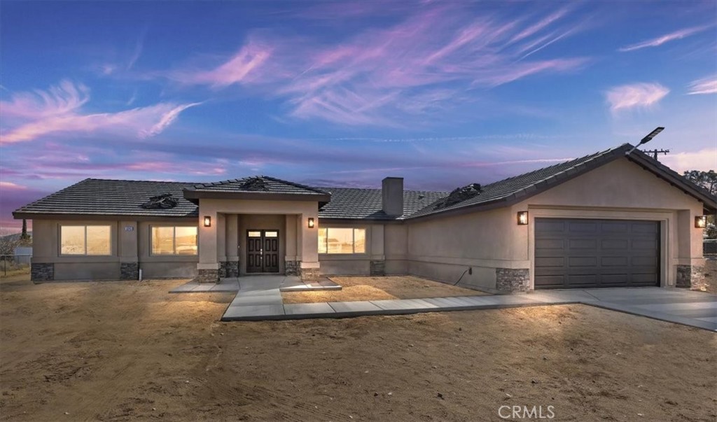BRAND-NEW HOME LOCATED IN A QUIET NEIGHBORHOOD OF HESPERIA!! GREAT COMMUTER LOCATION!! Very close to Ranchero Rd and Santa Fe Ave. It features 4 large bedrooms and 2.5 Baths. Energy-Efficient Upgrades – Includes PAID SOLAR PANELS, LED lighting, double-glazed low-energy windows, a tankless water heater, fire sprinklers, and high-quality insulation for maximum efficiency. Open Floor Plan with beautiful ceramic Tile floor throughout. Spacious Kitchen with an Oversized Island (9'x4'x2” thick) featuring an eating bar and decorative pendant lights above. Custom cabinets, self-close doors and drawers, a Trash drawer, and a large pantry with shelves. Beautiful Quartz countertops (2” Thick), backsplash, and Stainless-steel appliances. Large Main suite with room for a seating area and cozy carpeting, an elegant master bath full of natural light with separate tub and shower, a large mirror, and a spacious walk-in Closet with custom shelves.
Upgraded bathrooms with Quartz countertops, a private laundry area, and exterior light fixtures. 220V wiring is ready in the Kitchen, laundry, and water heater wall. Spacious 2-car garage with remote controls. This move-in-ready home offers everything you need and more! Don’t miss your chance to own this beautiful new home in Hesperia. The Outside grading and front fence will be installed soon. NEW PICTURES ARE COMING SOON!!!