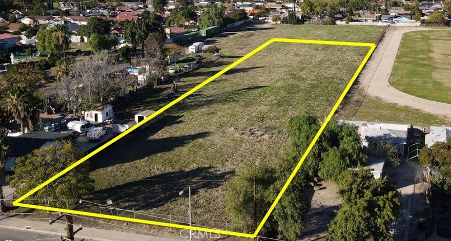 Vacant 1.75-acre infill land opportunity located along West Baseline Street in San Bernardino. This ±76,230 SF parcel (APN 0143-161-23-0000) offers an attractive low basis in a densely populated Southern California market, appealing to both conventional buyers and developers seeking long-term value.

The property features strong frontage and visibility along a major east–west corridor with approximately 18,766 vehicles per day, along with convenient access to State Highway 215. Zoned Vacant Land (NEC), the site provides flexibility for a variety of potential uses including self-storage, neighborhood retail, or multifamily development (buyer to verify zoning and permitted uses).

Surrounded by established community and institutional demand drivers, the parcel is adjacent to MLK Middle School and directly across from Arroyo Valley High School, with close proximity to California State University San Bernardino, San Bernardino International Airport, and Dignity Health Hospital. Limited infill land availability, strong population density, and excellent regional connectivity position this property as a compelling opportunity for immediate or future development.
