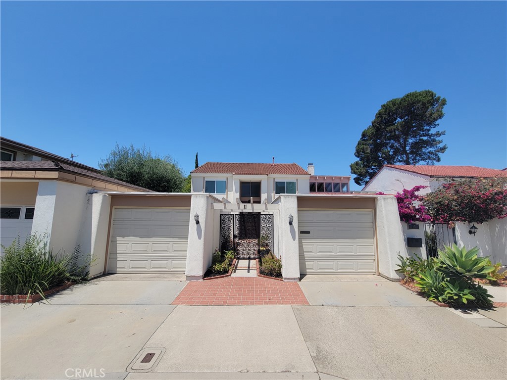 Nestled in the heart of University Park, this elegant 4-bedroom residence (2,304 sq. ft.) offers timeless charm and flexible living. A dramatic double-door entry leads into a vaulted-ceiling foyer, flowing into thoughtfully arranged formal and informal spaces. The vaulted master suite includes a serene balcony overlooking mature garden landscaping. With walkable access to top schools and a community rich in parks, pools, and trails, this home captures the essence of Irvine lifestyle. The adaptable formal dining room on the ground floor has been transform into a main-floor office or bedroom.