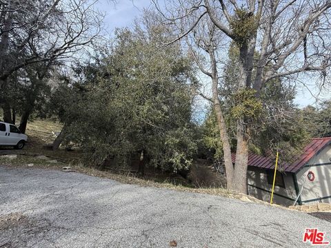 Photo of 24862 Edelweiss Drive, Crestline, CA 92325 (MLS # 26862495)