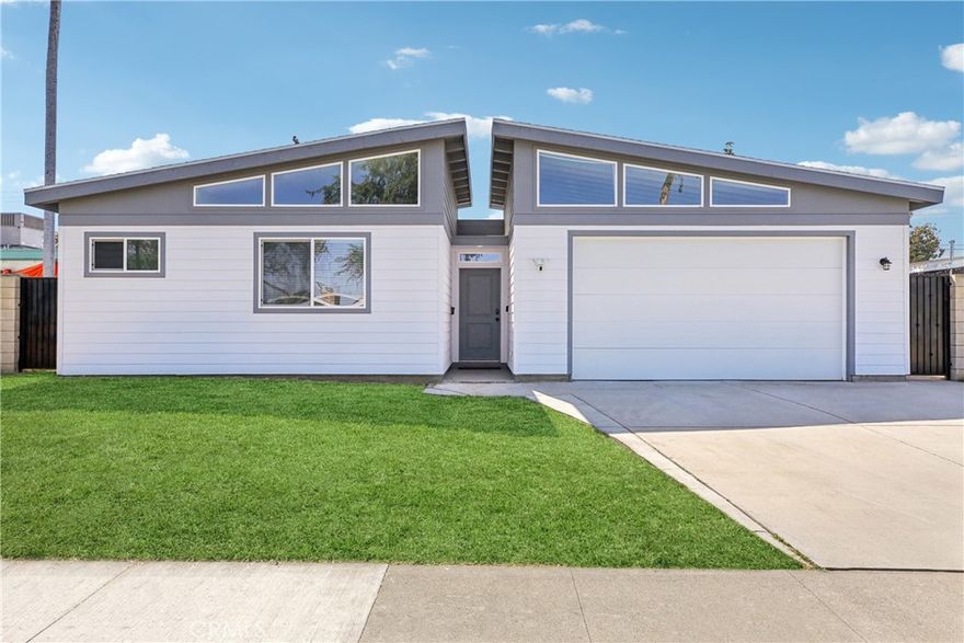 Discover 616 W Ash Avenue, a desirable Fullerton residence offering a blend of comfort, style, and impressive upgrades—all fully permitted. This single-family pool home features 4 spacious bedrooms and 3 full bathrooms. A 2020 front extension adds 467 sq ft, showcasing a generous master suite with recessed lighting, ceiling fan, laminate floors, and an expansive walk-in closet. The luxurious master bathroom boasts designer tile, a walk-in shower with premium fixtures, a spa tub, dual sinks, quartz countertops, extra cabinetry, and newer windows. The oversized garage accommodates tall vehicles and recreational gear with ease. The thoughtfully executed expansion enhances both functionality and appeal. The 2018 kitchen remodel provides granite countertops, abundant cabinetry, and stainless steel appliances (replaced within the last 2–3 years). Enjoy the inviting family room with a modern electric fireplace (added in 2023). Each bedroom offers ample space and storage. Step outside to a private backyard with a refinished chlorine pool (2016), a custom outdoor patio kitchen area (2022) with a mounted TV (included), and plenty of seating—perfect for entertaining. The property is dotted with mature fruit trees, including lemon, avocado, clementine, pluot, and chili, plus blackberry bushes. Additional highlights: remodeled bathrooms, an indoor laundry room, A/C slim condenser (2018), new blinds and flooring, exterior and interior fresh paint (2021), and a water heater less than a year old. Enjoy a true walker's paradise, with downtown Fullerton only minutes away. Benefit from low taxes, NO Mello-Roos, and NO HOA. Located in the top-rated Fullerton Unified School District and moments from shopping, dining, and entertainment. This exquisite home is a rare opportunity.