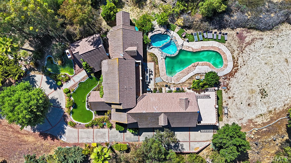Escape the hustle of city life and embrace the poetic paradise of Southern California’s wine country! Nestled in the heart of Temecula’s renowned Wine Country within the exclusive Country Road Estates community,offering breathtaking panoramic valley views that redefine upscale living. This is more than just a property—it’s a dream fortress tailored for equestrian enthusiasts, aviation aficionados, and nature lovers alike. Expansive Barn and Pastures for Multiple Horses.Whether you’re a professional rider or a casual enthusiast, these professionally designed equestrian facilities ensure safety and comfort—truly a rare gem in Southern California!One-of-a-Kind Private Airstrip: Sky-High Convenience at Your Doorstep.As a rare treasure in the Country Road Estates community, this estate provides direct access to the private community landing airstrip.This “fly-in, live-in” setup is exceptionally rare in the Southern California real estate market, offering the ultimate private sanctuary for aviation enthusiasts! Stunning Views and Elegant French Tudor Architecture,The main residence embodies classic French Tudor style with romantic arched doorways,three large fengshui-inspired ponds designed to attract prosperity and good fortune. Backyard Oasis: a three-tiered rock pool with cascading waterfall and oversize Jacuzzi, overlooking panoramic mountain ranges and valley sunsets. The large front and back Koi ponds, once home to vibrant fish, now serve as serene landscape elements infusing an Eastern fengshui charm. Perfect Blend of Wine Country Charm and Modern Convenience ositioned at the gateway to Wine Country, the estate is just steps away from numerous acclaimed wineries—enjoy world-class tastings and explore Temecula’s vast vineyards with a short walk or drive. Right next door, a spectacular hot air balloon scenic field allows you to watch colorful balloons dance across the sky from your own balcony at dawn or dusk, like a living dreamscape! Everyday conveniences are equally impressive: award-winning schools, shopping centers, Starbucks, and grocery stores,Crown Hill Park,sports park are only 5 minutes away, Experience rural tranquility without sacrificing urban accessibility.
Whether you’re an equestrian devotee, a pilot, or a wine country recluse, this is your exclusive kingdom. Bring your horses and aircraft to Temecula—your wine, equestrian, and aviation dreams begin here. Schedule a private tour today and discover this Southern California marvel!
