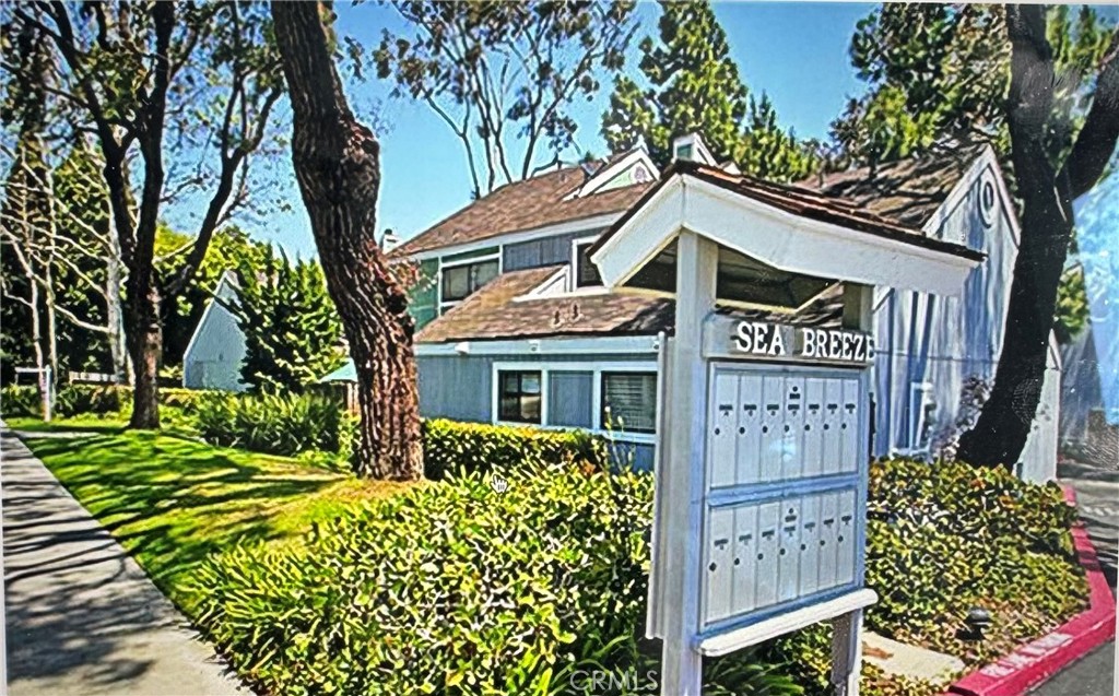 LOCATION LOCATION. RARELY available. less than 2 miles to the beach a 10min bike ride. Parklike setting very short walk to nature preserve. End unit sliding glass door to enclosed front patio and sliding glass doors leading to a large L shaped back patio with electric retractable awning and custom built in seating. Fireplace in living room. Large master suite with newly remodeled bathroom. Second bedroom has a large attic and a large closet for plenty of storage. Cute downstairs 1/2 bath. Google Nest is an added feature. Last sale same unit closed a couple of months ago for 925K