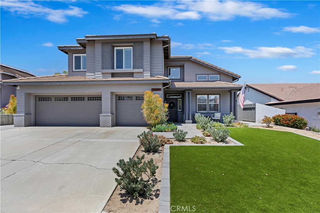 Welcome home! 2914 S. Buena Vista is a highly upgraded 4 bedroom, 4 bath home boasting almost 3,000 square feet and a three car garage! Located just below the green hills of the Cleveland National Forest in highly coveted South Corona just minutes from OC. Upon entry, buyers will love the cathedral ceilings and the spacious living and dining rooms. Downstairs all the flooring has been redone in a lovely neutral colored luxury vinyl plank, there are also new baseboards and wooden shutters throughout. The kitchen has handsome dark wood cabinets complimented by light quartz countertops and natural stone accents. The family room is very large, has a lovely view out to the backyard and is perfect for hosting guests. Downstairs there is also a full bathroom that was recently redone with a new vanity, tile flooring, and stylish wood paneling on the walls. Additionally there is an inside laundry room with plenty of storage. Upstairs are the four bedrooms. The primary bedroom has been completely remodeled and features a beautiful view of the hills. Upgrades include new carpet, wood shutters, and a new bathroom that features- new tile flooring, a new double vanity with matching mirrors, a floor to ceiling tiled shower and large soaking tub. One of the other bedrooms has its own attached bathroom, new windows and a walk-in closet. The other two bedrooms feature custom wood paneling, new windows and share a jack and jill bathroom. The back yard is a true oasis and has been lovingly cared for by the owners. There is a large concrete patio perfect for outdoor dining and entertaining. The large grassy area surrounded by trees and foliage, not to mention the mountain view is what backyard dreams are made of. On the side there is a shed and plenty of extra space for storage. There is ample room for parking in the three car garage and the extra wide driveway. The front yard has been redone with a walkway and porch made with concrete pavers as well as artificial turf and low water landscaping to not only give you a lower water bill, but also great curb appeal. The property has no HOA and no mello roos. Stay cool in the summer with solar panels and a whole house fan! Top rated schools, meticulously maintained parks, and plenty of shops, restaurants, golf courses and hiking trails are located nearby. Don’t miss out on this beautiful property!