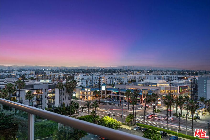 This immaculate 2 bed, 2.5 bath unit features 1,900 square feet, and gorgeous City and Mountain views from the 9th floor of the full-service, Regatta. This completely private, spacious, and light-filled unit features 9-foot ceilings, floor-to-ceiling windows, and a huge wrap-around balcony with a gas BBQ hook-up perfect for entertaining and enjoying the picturesque panoramic views. The oversized living room includes a cozy fireplace and gorgeous wood floors. The chef's kitchen is equipped with granite countertops, maple cabinetry, gas cook-top and premium appliances. Primary bedroom offers stunning views, easy access to the balcony, 2 large walk-in closets, and a stunning bathroom with dual sinks and a separate tub and shower. Second bedroom is located on the other side of the unit ideal for privacy, and includes its own large en-suite bathroom and walk-in closet. This amazing unit also includes a powder room for guests, side by side washer/dryer, 2 car parking and more!  Rent includes cable with HD channels, internet, water, trash and an abundance of resort-style amenities - 24 hour valet parking for guests, 24 hour front desk & security, concierge, rooftop spa and sky-lounge with panoramic views, outdoor kitchen with BBQ's, sparkling heated pool and spa, business center, media lounge, fine art collection, indoor/outdoor professional fitness center with yoga/pilates training studio, and more. Just seconds from world famous beaches, marina access, bike path, dog walk, trendy shops/restaurants, LAX and more!