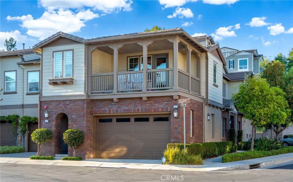 Welcome to this rare end-unit residence offering one of the largest private backyards in the community—bright, quiet, and highly private. This 2,248 sq. ft. home features high ceilings, recessed lighting, built-ins, and a cozy fireplace.
The open chef’s kitchen includes granite countertops, cabinetry, quality appliances, and a large island, flowing seamlessly into the living room and outdoor patio, perfect for entertaining.
The main-level primary suite boasts a luxurious bath with soaking tub, walk-in shower, and dual vanities. A second bedroom and bath are also on the first floor. Upstairs, a private bedroom/office includes an en-suite bath and balcony with views.
Additional upgrades include a remote-controlled garage system, a water recirculating pump for instant hot water, one-year- new luxury washer and dryer.
Community amenities feature a pool, spa, clubhouse, BBQ area, and walking trails. Prime location near Black Gold Golf Course, award-winning Yorba Linda High School, and Eastlake Village Shopping Center.