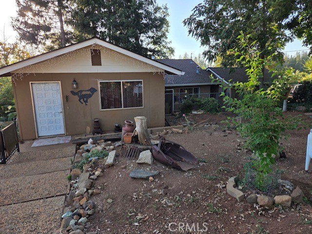Charming 1950s Vintage Home on 0.66 Acres
Step into this vintage 1950-built home offering 1,296 square feet of country charm with 2 bedrooms, 2 baths on a serene 0.66-acre corner lot completely fenced with mature trees. Entrance to property is at Pentz road and Middle Tree lane. This cozy home designed for comfortable living and plenty of outdoor space to enjoy the peaceful setting. The spacious master bedroom features a walk-in shower. Relax on the covered deck, perfect for enjoying the fresh air, or tend to your own garden in the dedicated garden area. The property is fully fenced for privacy and security. It is conveniently located near Noble Orchards a local favorite for fresh fruit produce and beautiful views. A 210-square-foot shop offers ample space for storage or as a workshop, and a built in Murphy bed just in case you have guests. This home blends vintage appeal with modern necessities, offering the perfect mix of nostalgia, functionality, and a peaceful country lifestyle near schools and shopping. Roof is approximately 10 years old.