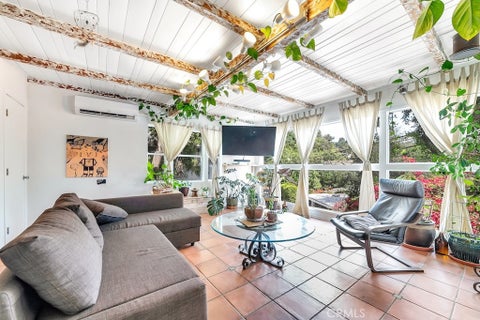 Photo of 8869 Lookout Mountain Ave AVE, Los Angeles, CA 90046 (MLS # SR26149537)