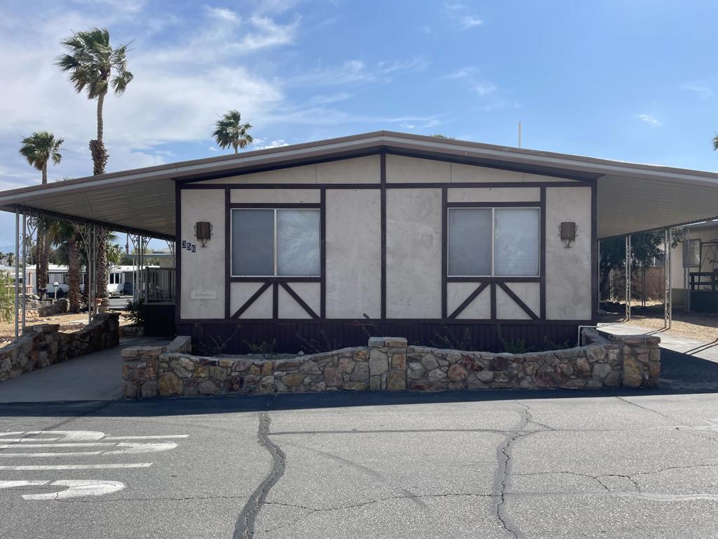 Fabulous 3 Bedroom, 2 Bath Double Wide Mobile Home in the Hidden Little Gem of Sky Valley Resort! Situated on a Huge Corner Lot, Steps away from the West Clubhouse which offers Pools, Spas,Cafe', Billiard & Card Room! This Home has Beautiful Laminated Flooring throughout! Spacious Kitchen with Large Pantry and Breakfast Bar Seating. Living Room & Dining Area right off the Kitchen. There's a separate Den/Office area for Extra Living Space.Refrigerator, Washer, & Dryer are Included! Sit out on your Large New Trex Deck and take in the beautiful Mountain Views! Low Maintenance Desert Landscape. There's a Large Shed for Extra Storage & Workshop. Sky Valley Resort is a Gated, Family Community. The Resort offers MANY Great Amenities including 13 Hot Mineral Pools & Spa's, Fitness Center, Sauna, Tennis Courts, Pickle Ball Courts, Horseshoes, Cafe, Chapel, & a Doggie Park. As a Resident you can Golf at the Sister Park, Caliente Springs, which is only a couple miles down the Road. The Property has Space Rent and is not on Leased or Fee Land. The Space Rent is $1,203./mo. Short Term Rentals are Allowed with Restrictions.Come out and explore the Amazing Desert Lifestyle. Palm Springs & Palm Desert is just 15-20 minutes away! You can get Financing on this Property.