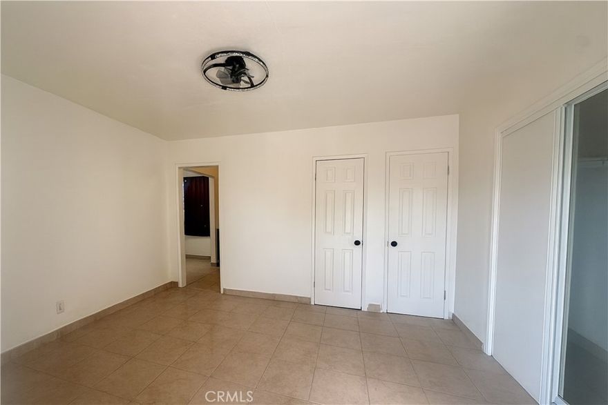 Welcome to this beautifully remodeled first-floor apartment featuring a spacious 1-bedroom, 1-bath layout with tile flooring throughout. Enjoy the convenience of two assigned parking spaces, included in the rent. Ideally located just minutes from Downtown Los Angeles, SoFi Stadium, BMO Stadium, and USC, this home offers comfort and accessibility in a prime central location. The property welcomes Section 8 and subsidized applicants.