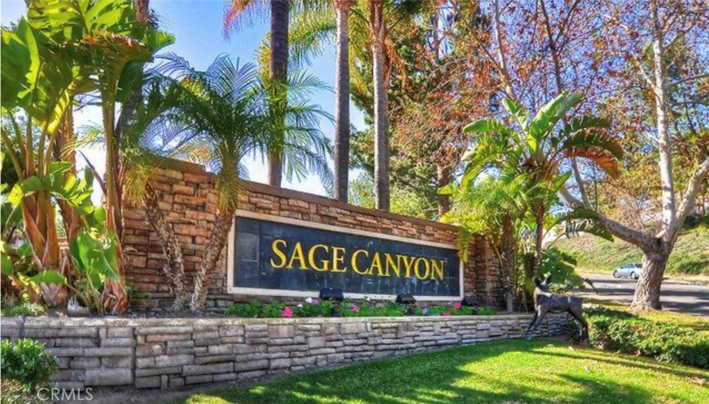Have you ever wanted to live in Corona? Now is your chance. Beautiful condo in Sage Canyon Community. The unit offers 2 bedrooms and 2 full baths all on one level. One of the bedrooms is a primary suite with walk in closet. Laminate flooring, Faux Stone Fireplace, stainless steel appliances, Indoor laundry, hallway closest and a spacious private balcony to relax and enjoy your morning coffee. The amenities include a pool, spa, fitness center,, basketball courts and clubhouse. Includes a covered carport and assigned space. Close to freeways and shopping.