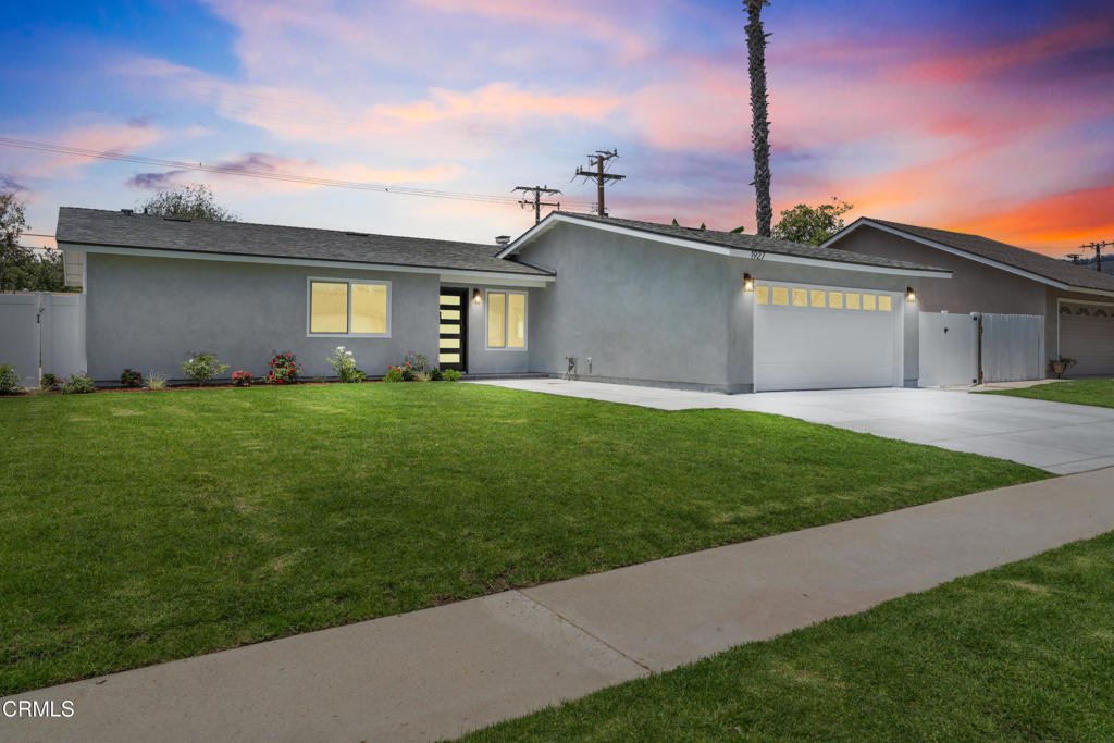 Do you love new homes but hate HOA fees, Mello Roos taxes, and tiny backyards? This is as close as it gets to a brand-new home -- but with a spacious backyard, RV parking, single-story convenience, and a fantastic location at a reasonable price. This stunning renovation was so extensive, even the insulation was replaced! Nearly everything is new: smooth stucco, energy-efficient Milgard windows, solid-core doors throughout, a brand-new HVAC system, upgraded insulation (including exterior walls), fresh drywall, a new electrical panel, new flooring and baseboards, new walkways, driveway, vinyl fencing -- even the toilets are new! As you arrive, you're welcomed by a large, lush front yard with new walkways, a sprinkler system, and a stylish new front door. Step inside to a spacious, open living and dining area highlighted by a modern custom fireplace. The kitchen is a showstopper, featuring new cabinets, quartz counters, stainless steel appliances, recessed lighting, and thoughtful finishes throughout -- all designed with you in mind.Enjoy single-story living with no stairs, ideal for long-term comfort. Each bedroom includes new solid-core doors, updated windows, custom closets, and upgraded insulation. The primary suite offers two custom closets and a beautifully updated bathroom with double sinks, a custom glass shower enclosure, and a pocket door for a sleek, space-saving touch.The hall bath features a new tub and shower with a rain shower head and niche, a modern vanity, matching fixtures, and quiet exhaust fans with moisture-sensing switches. Outside, relax in your private backyard with brand-new vinyl fencing, fresh sod, and a new irrigation system. The garage boasts a fresh epoxy floor and connects to the new driveway for easy access. Best of all, you'll love the peaceful, established neighborhood -- close to shopping, top schools, the library, and the hospital -- and far from busy streets or freeways. Don't miss this rare opportunity to enjoy a practically new home without the extra fees or cramped lots. Come see it today!