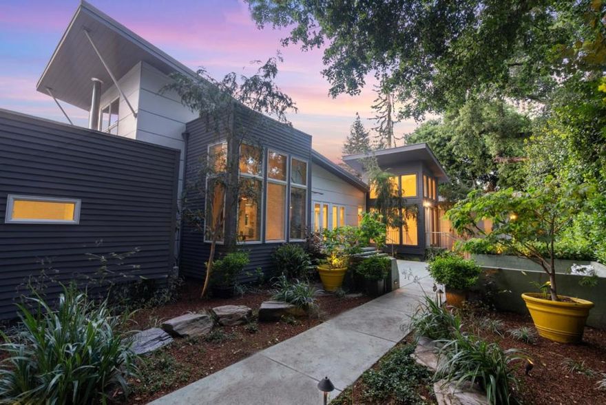 Video 900olivestreet.com  Amazing light & space, surrounded by greenery! Designed by Siegel & Strain Architects & built by Clarum Homes as a former Sunset Mag "Idea House" this property was conceived to push boundaries, feature sustainable materials and celebrate indoor-outdoor living. Soaring ceilings, oversized windows, and glass panel doors allow sunlight in. Open-concept floorplan connects generous outdoor entertaining courtyard w/built-in firepit & dining area. Chef's kitchen features Ceasar Stone counters, Heath Ceramics tile, stainless steel appliances, & wine fridge. A cozy family rm bridges to/3 large en-suite bedrms. Plus an entire 2nd level below grade! Transome windows punctuate the perimeter for natural light. Giant fun-zone offers media wall, full second kitchen, & features a mural by internationally recognized, Ian Ross. Rounding out the space, 2 large en-suite bedrms, 6th office/bdrm, laundry area, storage, & steam shower. An uncommon Central MP offering. Don't miss it!