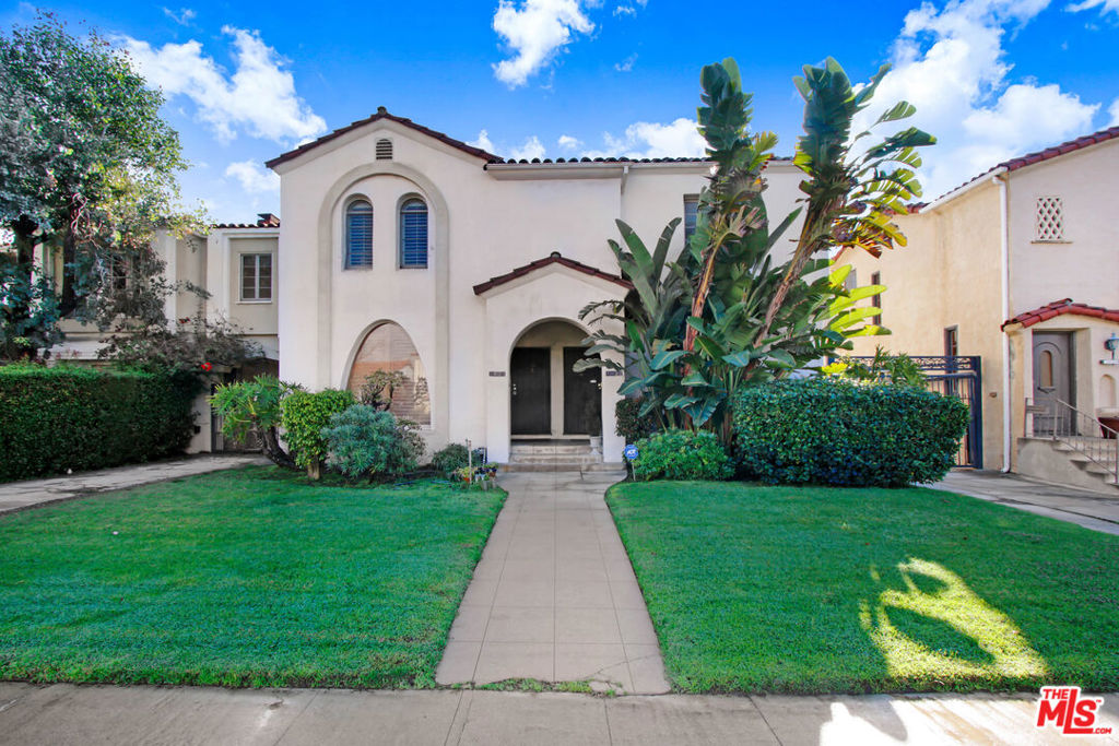 Gorgeous 3 bedroom home in Carthay Square Neighborhood which is centrally located to nearby shopping, restaurants, medical facilities, cultural institutions and services. A short walk to Petersen Automotive Museum, LACMA, The Japan Foundation, Academy of Motion Pictures Museum and a small drive to Downtown LA, LAX, Century City and Downtown Beverly Hills. The home offers a bright open floor plan with hardwood floors throughout. Fall in love with the warm kitchen and it's walk in pantry. The master bedroom has a powder room with a sizeable bathroom. If you work from home and need separation then, you will enjoy the private office situated in the back and has it's own private door to avoid any interruptions. Parking is no problem, as the home comes with a 2 car detached garage. Open comfy warm patio in the rear for relaxing after a hard day of work.