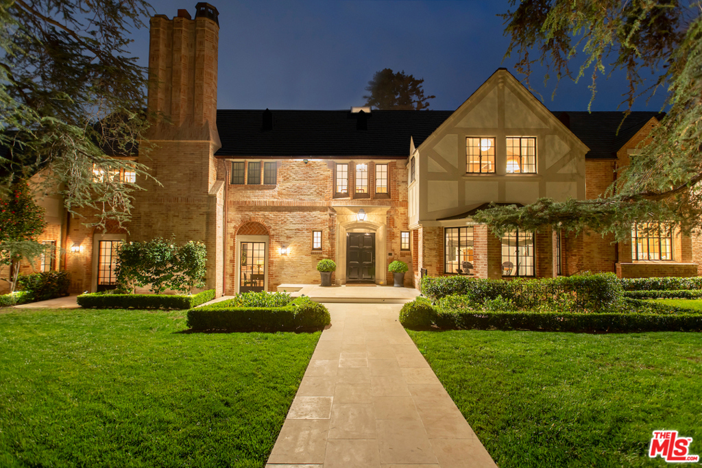 This timeless estate represents a level of character and luxury rarely offered and speaks to an era of architectural integrity with unmatched detail and quality. As one of the original homes in the Riviera section of the Palisades, this home boasts lavish amenities & enviable privacy. Gorgeous 100 plus-year-old trees flank over a flat half-acre, w/ west-facing grounds, beautiful swimmers pool and sport court, & treehouse. The gracious main rooms overlook the stunning southern terrace and grounds. A masterful kitchen boasts an immense island, state-of-the-art appliances, a windowed breakfast room, a generous butler's pantry, and an intimate family room. The massive dining and living rooms and private office are grand in scale, set against a backdrop of greenery. Upstairs there are five bedrooms. The primary suite is a lavish retreat with dual baths & dressing rooms. The secondary bedrooms all have private baths with imported tile. There is a primary house screening room and speakeasy. The separate, well-appointed pool house with additional space for entertaining, gym, guest suite and 2.5 baths has 20 ft ceilings in game room and a fireplace. The perfect home for large family gatherings and gracious events yet is surrounded by privacy and is one of the most significant estates to become available in the famed Pacific Palisades.