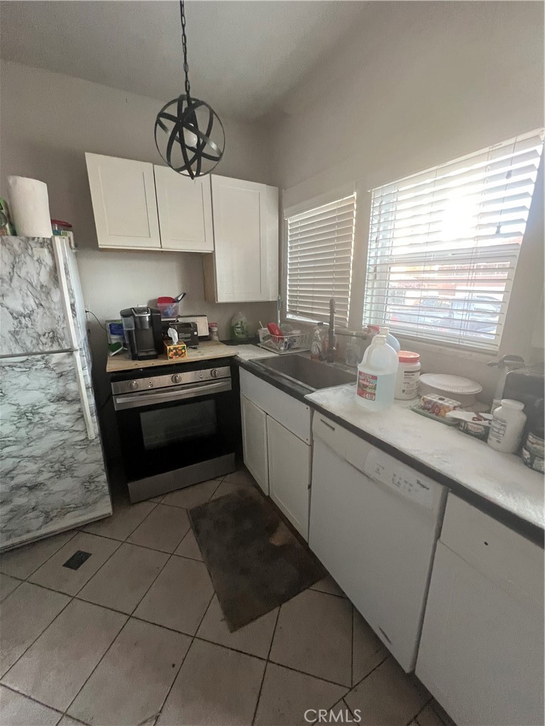 A great opportunity to own a charming OYO (own your own) studio in the heart of Downtown Long Beach. Nestled in a Historic Building, with the security features such as locked entrance doors and surveillance cameras, this studio offers an open floor plan, natural light with multiple windows, kitchen with granite countertop and easy-cared tile floor. Property comes with an assigned parking space. Desirable location, surrounded by culinary restaurants, close by the performing art center, just mins away from the beach, museums, the seashore village, walking and biking path. This is a perfect investment property or ideal for an owner who seeks to own a minimal living space and enjoys vibrant urban lifestyle.