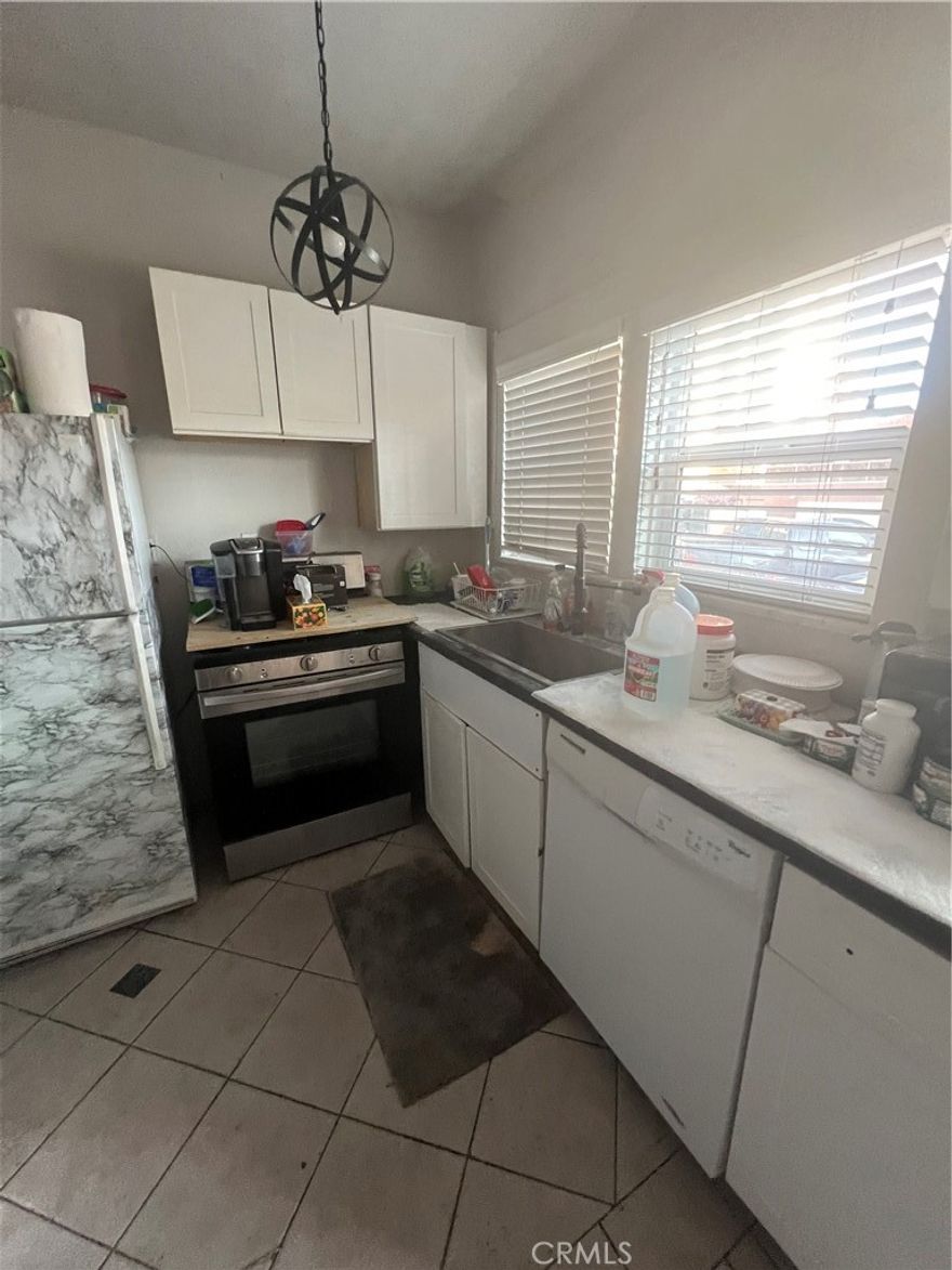 A great opportunity to own a charming OYO (own your own) studio in the heart of Downtown Long Beach. Nestled in a Historic Building, with the security features such as locked entrance doors and surveillance cameras, this studio offers an open floor plan, natural light with multiple windows, kitchen with granite countertop and easy-cared tile floor. Property comes with an assigned parking space. Desirable location, surrounded by culinary restaurants, close by the performing art center, just mins away from the beach, museums, the seashore village, walking and biking path. This is a perfect investment property or ideal for an owner who seeks to own a minimal living space and enjoys vibrant urban lifestyle.