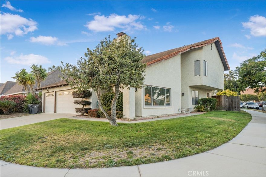 Welcome to this spacious two-story 4-bedroom, 3-bathroom home offering 1,924 square feet of living space, complete with an oversized 3-car garage and a beautifully landscaped backyard on a corner lot!

Step inside to a well-designed floor plan featuring a formal living room and formal dining area, providing flexible spaces for entertaining or everyday living. The heart of the home is the open-concept family room, breakfast area, and a large, traditional kitchen, all seamlessly connected with direct access to the backyard—creating a natural flow between indoor and outdoor spaces.

A bedroom and full bathroom downstairs provide flexibility for guests, work, or additional living arrangements. Upstairs, you'll find three additional bedrooms, including the spacious primary suite featuring a large walk-in closet and an en suite bathroom complete with a soaking tub, separate shower, and double vanity. The guest bathroom upstairs is conveniently located to serve the additional bedrooms.

Step outside to enjoy a lush backyard with established fruit trees, including a mature avocado tree, and plenty of grassy space for outdoor enjoyment.

With its generous layout, multiple living areas, and expansive outdoor setting, this home offers a wonderful combination of space, comfort, and functionality.