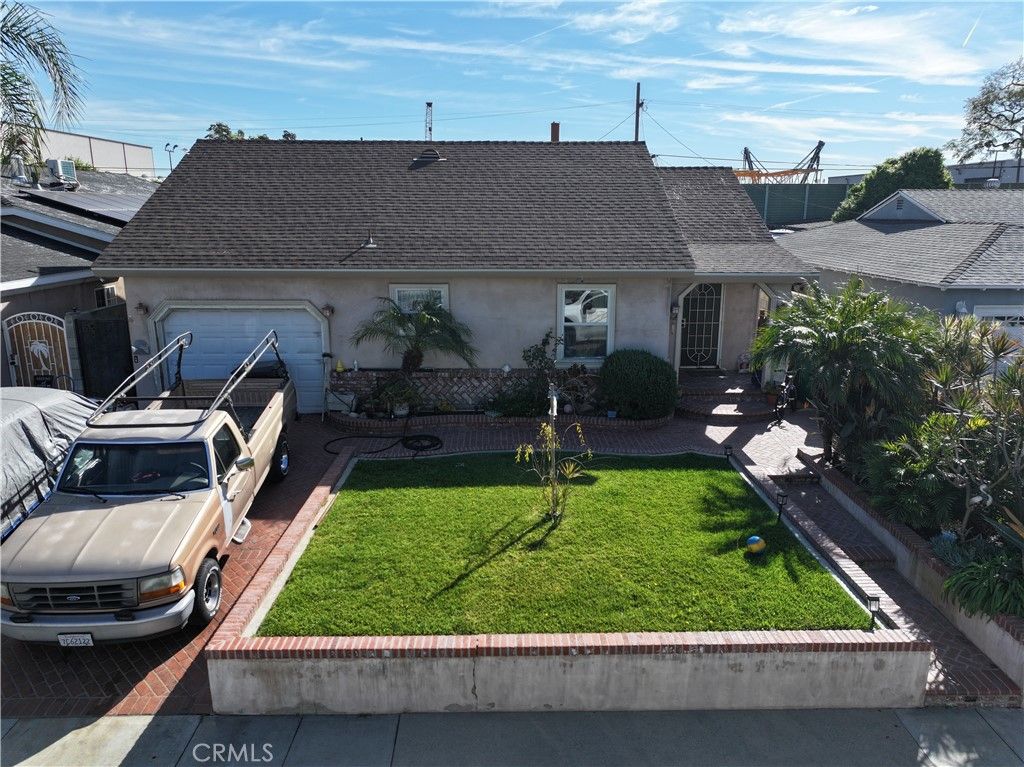 Photo of 6308 Raymond Ave, Long Beach, CA 90805 (MLS # RS26056719)