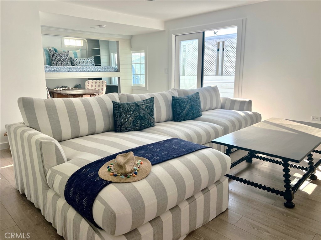 COMPLETLY furnished remodeled manufactured home in Bayside Village in the heart of Newport Beach available for lease for 6 months or 1 year. Just steps to Back Bay, marina, private beach, bay side pool/spa/clubhouse and recreational facilities. Just minutes to Balboa Island, Fashion Island and world class beaches & restaurants. Property has been completly renovated by a designer out of Malibu, CA. The interior includes new doors, flooring, cabinets and bunk room. Newer windows, bathrooms and barn sliding bathroom door make up the primary suite. An extra large deck with designer tile and private fenced in area for entertaining. Fences and gate access completely enclose the property. A large covered carport for your vehical. Numerous community amenities including 2 clubhouses/pools/jacuzzis, private beach, sports court, barbeque/picnic areas, gym and DOG PARK!
