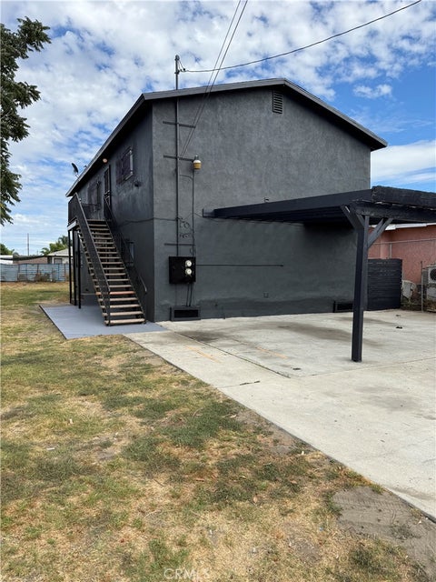 Photo of 10974 Willowbrook Avenue, Los Angeles, CA 90059 (MLS # PW26217372)