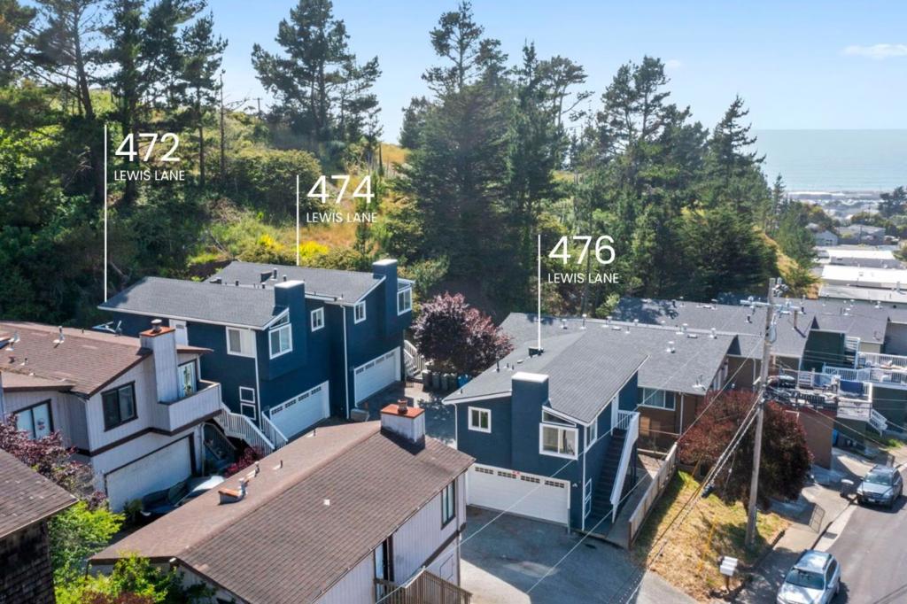 Rare Pacifica Triplex with Ocean Views! Completely renovated in 2018, each multi-level townhouse in this 3-unit complex has 2 bedrooms /1 bath on the upper level and a dedicated 2-car garage and laundry space on the lower. All units have spacious bedroom, bath, living rooms, and kitchen designed for easy living on the coast just moments away from local Pacifica hot spots, shopping, and easy beach, hiking, and golf access. Occupancy details are as follows: 472 Lewis Lane (Unit #1): Currently rented to a long-term tenant | 474 Lewis Lane (Unit #2): Currently operating as a short-term rental and can be delivered vacant | 476 Lewis Lane (Unit#3): Currently operating as a short-term rental and can be delivered vacant. 472-476 Lewis Lane is just 3-minutes to the beach, making this property attractive to a broad tenant base and perfect for an investor looking to capitalize on a well-maintained coastal rental opportunity. House-hackers/owner-occupiers will appreciate the income-producing potential while enjoying coastal living just moments from the ocean. Hwy-1 is 3 minutes away, with easy access to 280-35-101, Colma BART, and SFO. 18 minutes to South San Francisco, San Francisco, San Bruno, and Colma.