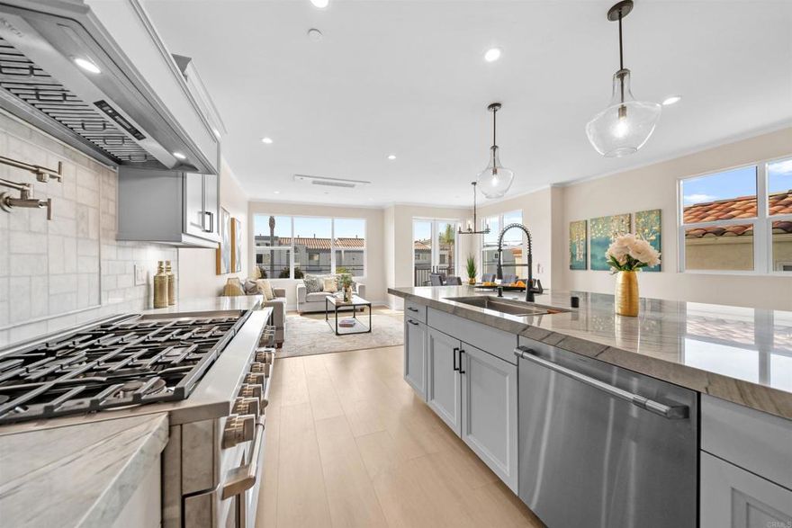 Opportunity Knocks, Fabulous New Construction "Marina Vista Villas" - One of three units in the building: 3,200+ square feet of luxury appointments with 3+ Bedrooms & 4 1/2 Baths, lock-off unit w/kitchenette oversized 2 car garage (with extra room for a gym), private elevator to three primary floors, designer finishes including custom tile, iron work, marble and granite countertops, "multiple mini-split heating and A/C units" and custom cabinetry. So many features and touches you will absolutely LOVE. Add in a PRIVATE 500sf Oceanview rooftop deck with six person spa and phenomenal walkability to beach, downtown, harbor and train station! Daily life will feel like a permanent vacation. Ocean Views and glorious sunsets.