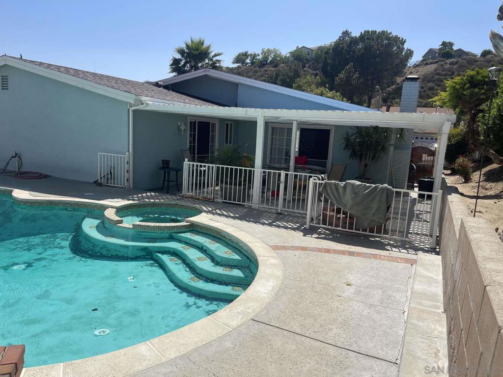 This Santa Clarita home features an attached 2-car garage and a spacious backyard with an in-ground pool and decking. Enjoy modern comforts like a gas tankless water heater, newer HVAC, and new copper plumbing. The updated kitchen shines with granite counters and newer stainless appliances. A revitalized living room and two upgraded bathrooms enhance the interior. Four bedrooms provide a canvas for your personal touches, with new interior doors underway.