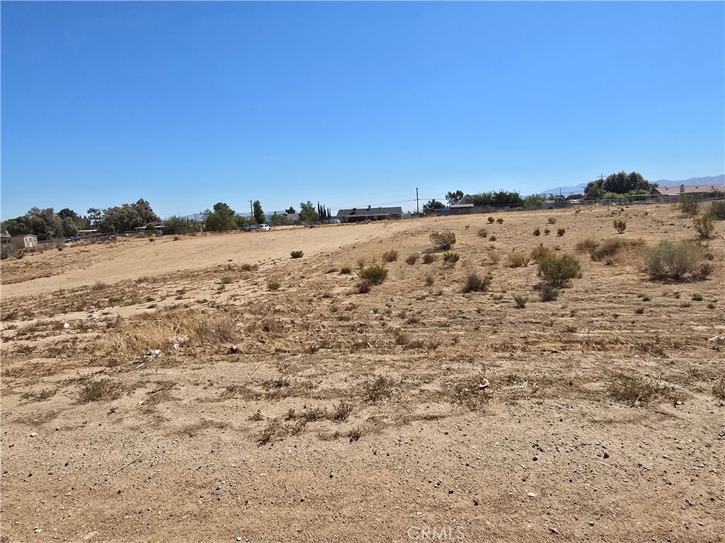 Prime Commercial Opportunity on Hesperia Road
Positioned along one of Hesperia’s busiest corridors, this 0.67-acre commercial parcel delivers outstanding visibility and a clear path for development. With over 100 feet of frontage on Hesperia Road, your future project will be right in front of steady daily traffic, perfect for maximizing exposure.
The land is flat, open, and development-ready, with utilities close by to help reduce upfront building costs. Its Commercial zoning offers flexibility for a wide range of uses, whether you envision a retail storefront, restaurant, automotive service, or professional offices.
Located just north of Eucalyptus Avenue and minutes from Bear Valley Road, the site sits at the heart of a growing community. It’s surrounded by established neighborhoods and expanding commercial activity, ensuring a strong customer base both now and in the years ahead.
Whether you’re an entrepreneur ready to launch your business or an investor seeking long-term growth potential, this parcel is a rare chance to secure a prime location in Hesperia’s thriving market.
The address is for reference only. The property is located between 11389 and 11443 Hesperia Rd