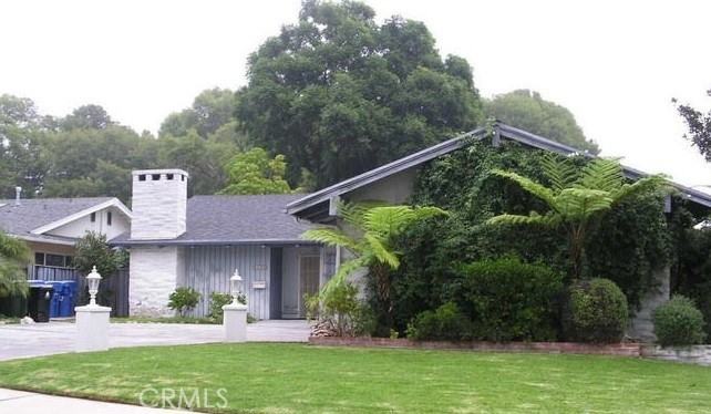 Welcome to your secluded slice of paradise in the heart of Van Nuys! This beautifully landscaped 4-bedroom, 2-bathroom home sits on a private street with speed bumps. The spacious backyard is perfect for barbecues, family gatherings, or simply relaxing among nature, featuring over half a dozen palm trees, a flourishing rose garden, and fruit-bearing peach and lemon trees.
The master bedroom has its own private entrance and can easily be used as a detached guest suite with three walls already in place—great for multigenerational living or extra income potential.
Enjoy living just two blocks from scenic Lake Balboa, with access to jogging trails, sports facilities, and a golf course less than a mile away. This home offers the perfect blend of outdoor adventure and indoor luxury—ideal for families, entertainers, or anyone seeking tranquility in a vibrant neighborhood.