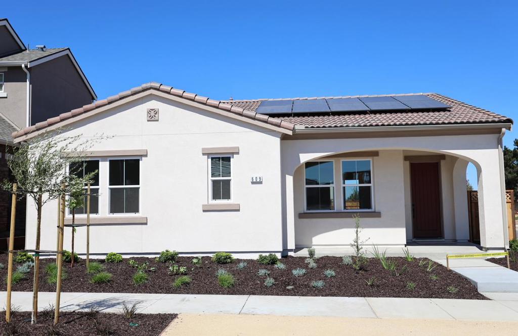 A thoughtfully designed single-story floor plan that seamlessly combines elegance with functionality, offering a distinctive living experience. Located on a desirable corner homesite and within walking distance to a future neighborhood park, this home showcases timeless style with white cabinets, quartz countertops, nickel finishes, and stainless-steel appliances including a stovetop and dishwasher. Step into the heart of the home a spacious great room that connects the living room and kitchen in an open-concept layout, perfect for entertaining and special occasions. The luxurious Owners Suite includes a large walk-in closet, dual sink vanities, and sliding glass door access, creating a private retreat filled with natural light. Additional highlights include energy-efficient features, abundant storage, and a two-car garage. With its modern finishes, prime location, and inviting layout, this home is designed for both comfort and memorable gatherings.